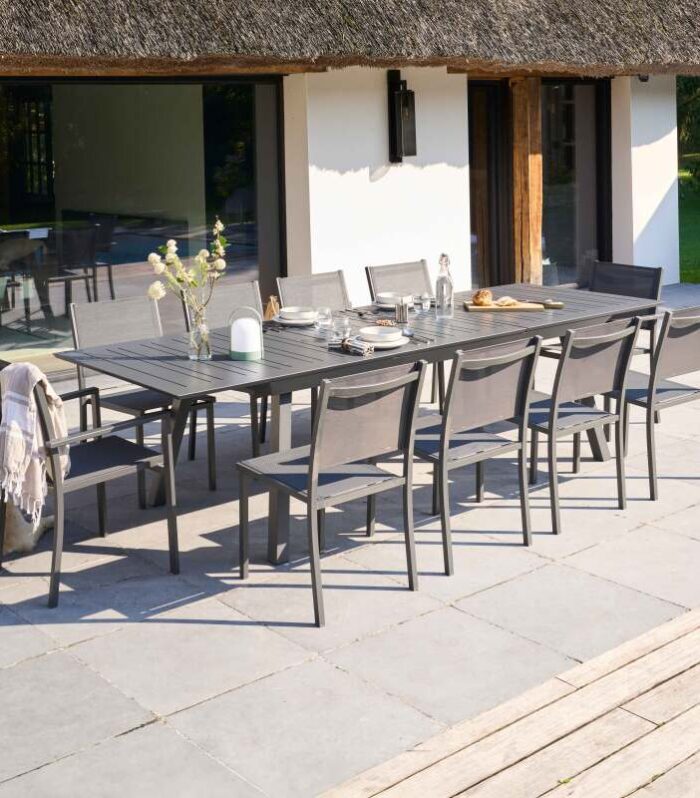 Mesa de jardín extensible de aluminio 216/298x100 cm y 10 sillas de textilene